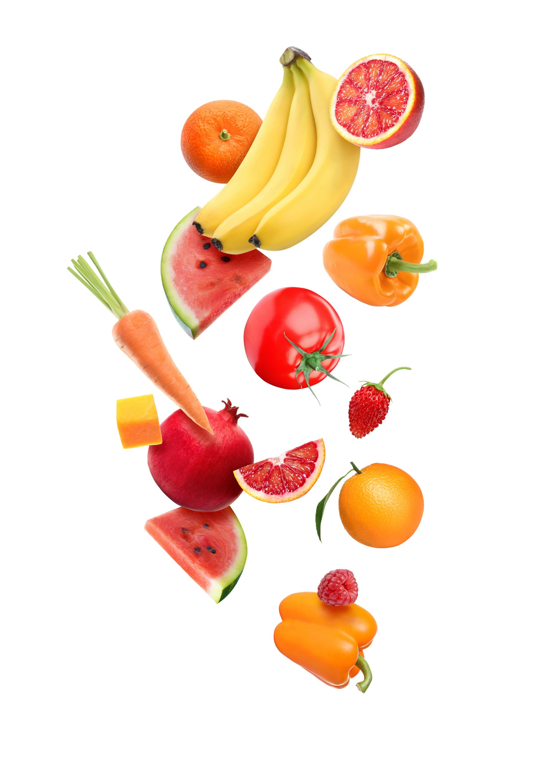 Different fresh fruits and vegetables in air on white background