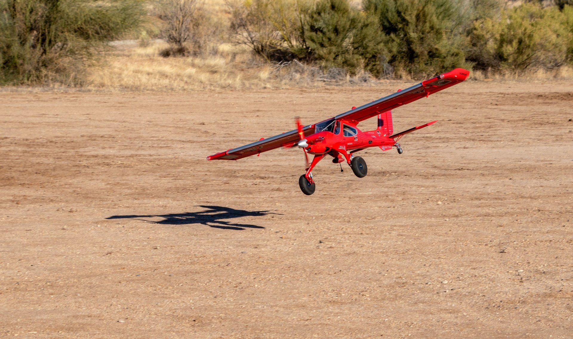 RC plane touching down